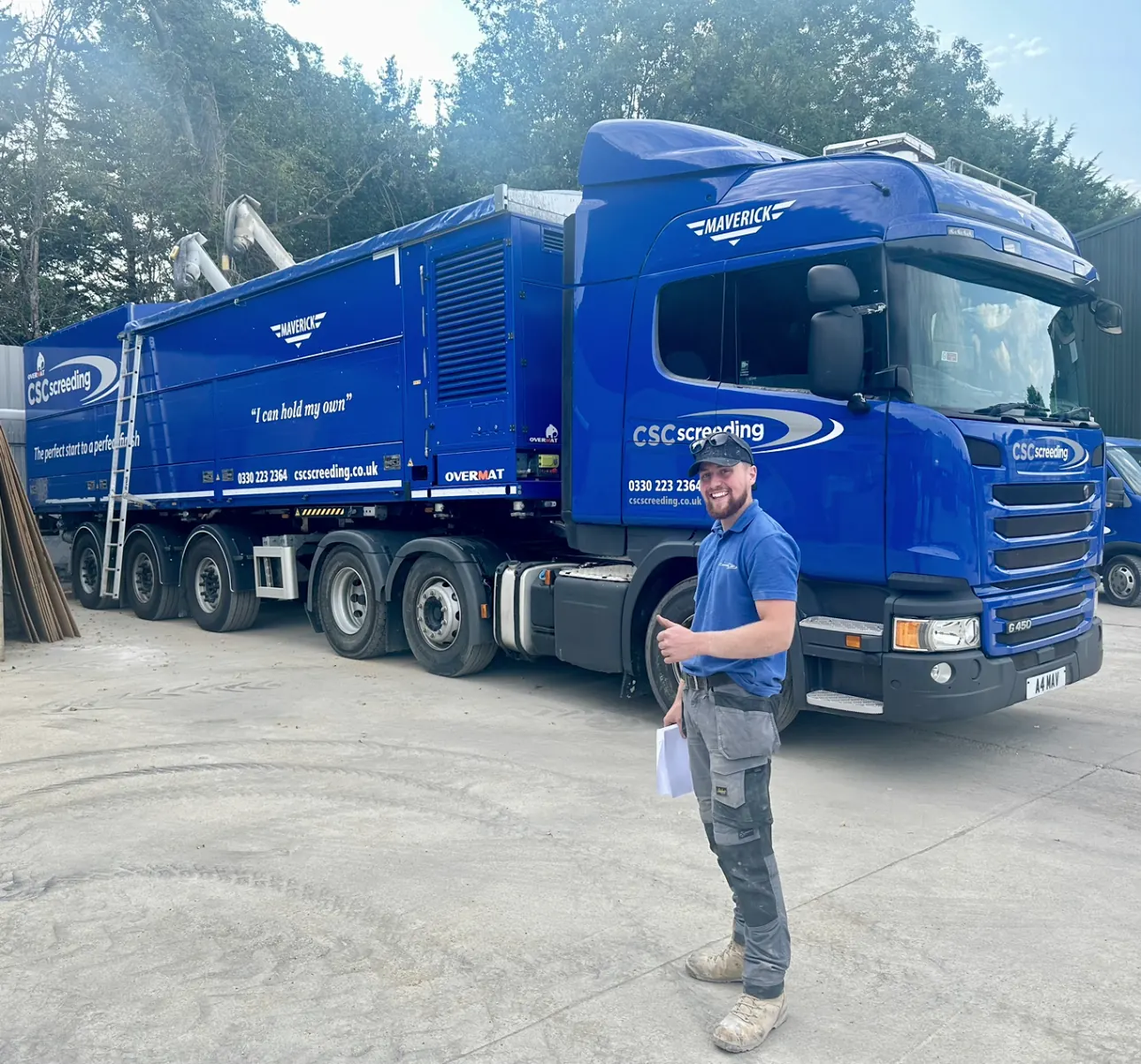 A CSC operative beside the blue Maverick screed truck